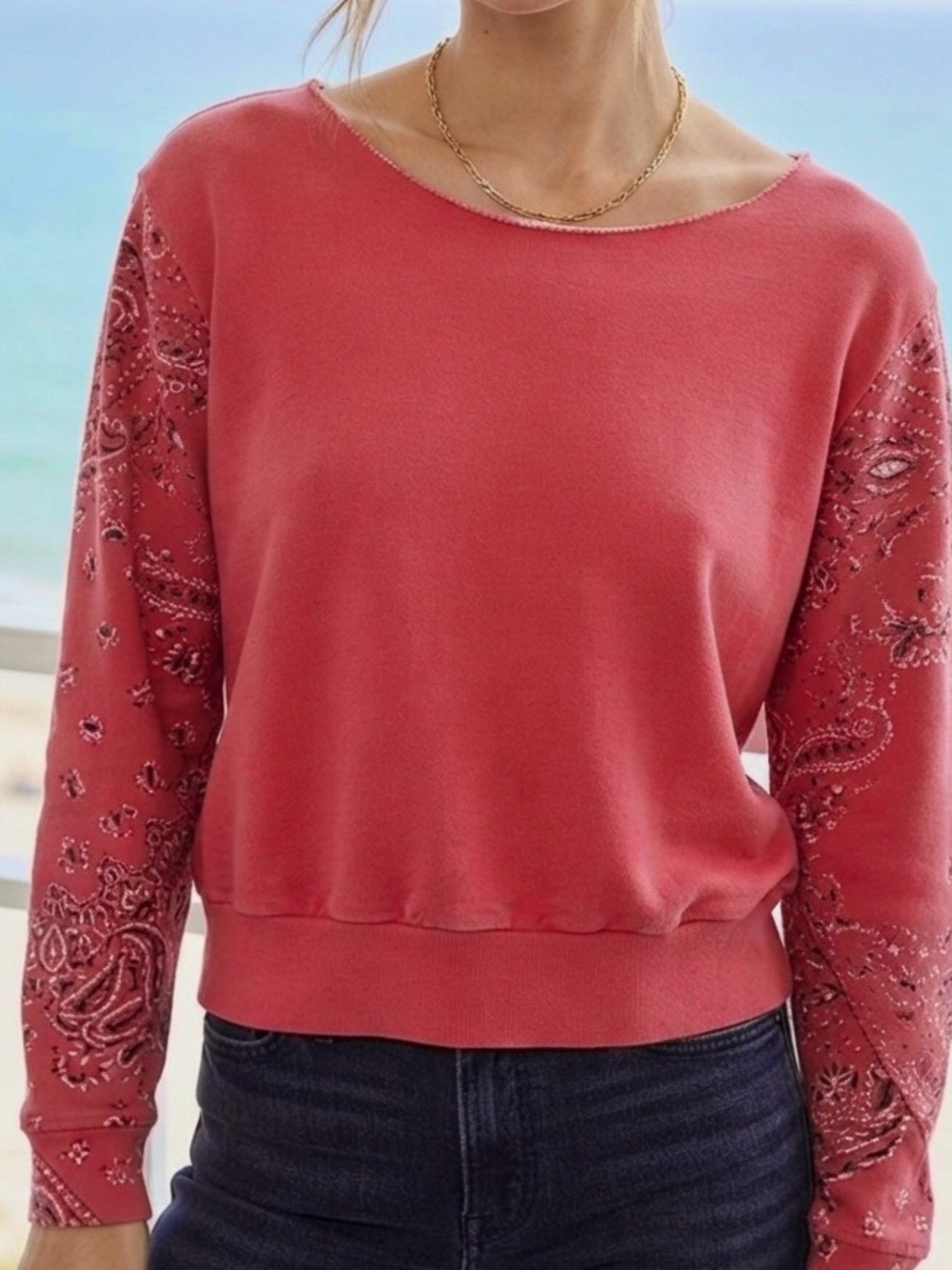 Western like  sweat shirt with bandana print sleeves.